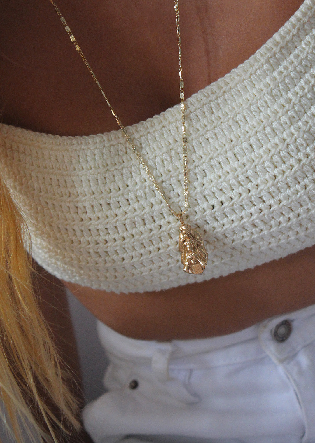 Collar Monos Tótem Coherencia